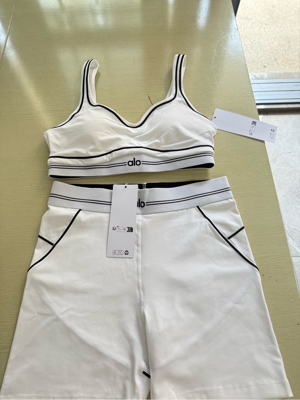 ALO Yoga White Sports Bra & Matching Shorts with Black Seam Detail - Picture 3 of 6